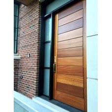 Solid modern door with groves and sidelight