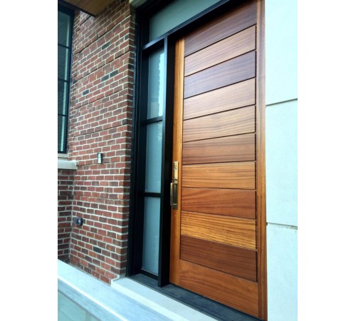 Solid modern door with groves and sidelight